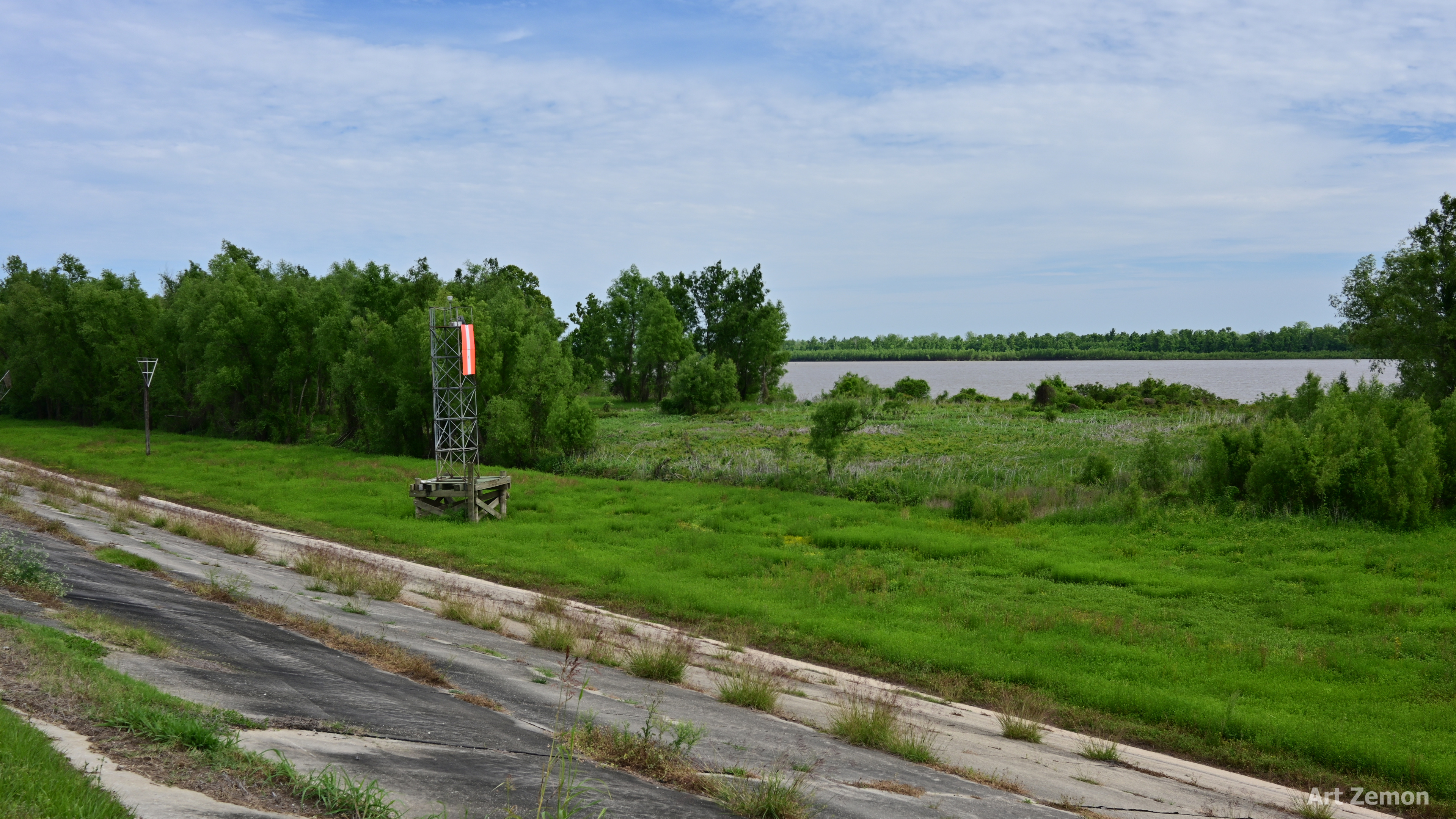 an old river navigation bouy next to the Mississippi River