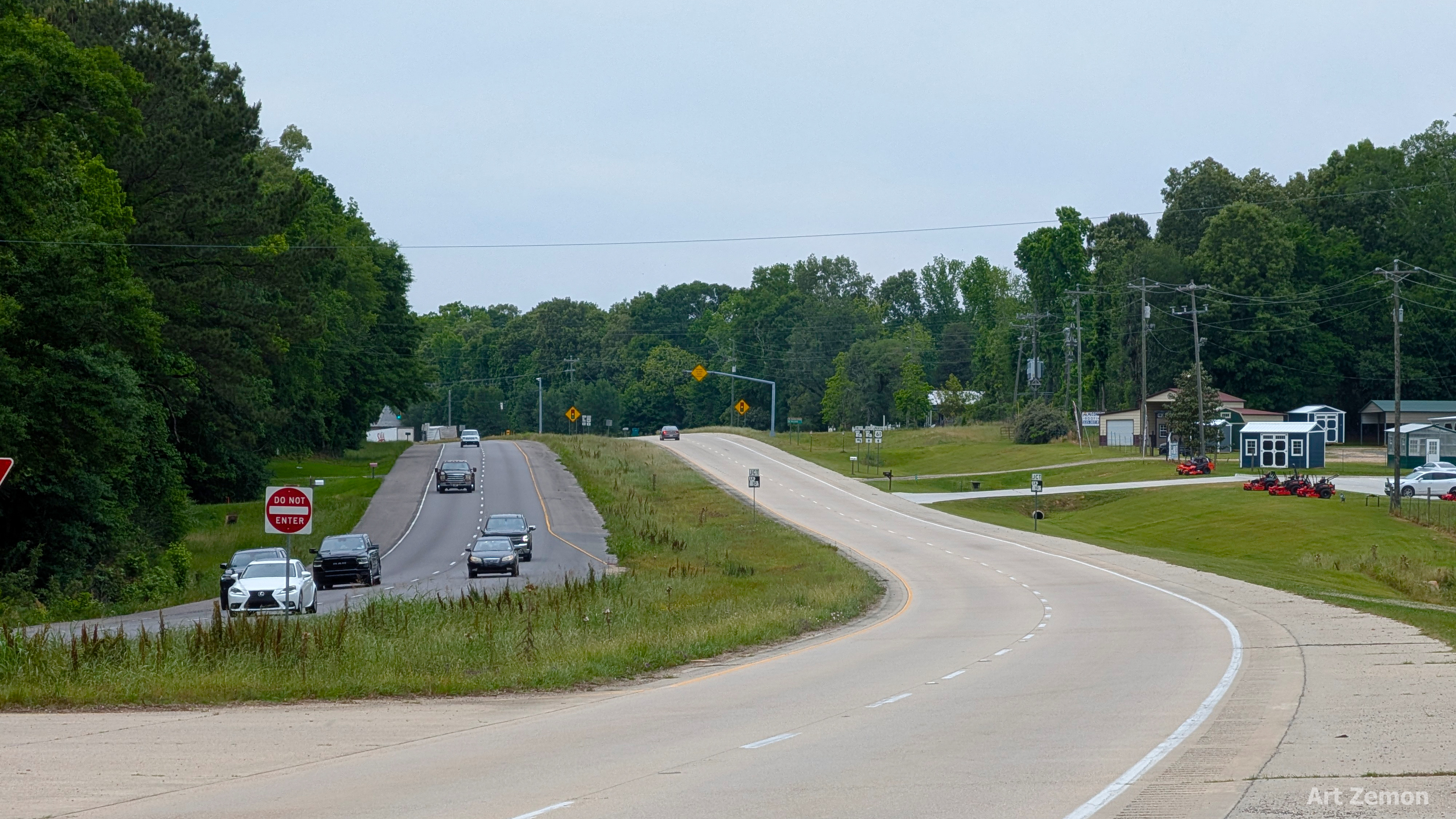 four lane divided highway with a wide shoulder